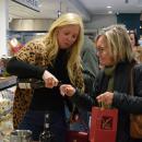Judie and Hallee try wine paired with cheese. 