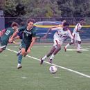 Logan Stott runs for the ball. 
