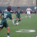 Kaleb Medeiros attempts to get the ball from an opposing player. 