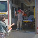 JJ, age 5, explores the ambulance. 