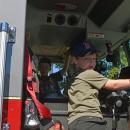 Two kids explore the fire truck. Photos by Kat Sheridan