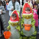 Jones (4) and Lion (7) dressed as matching dinosaurs. 
