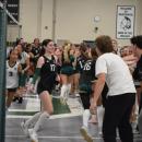 The students run past their friends for high fives. Photos by Kat Sheridan