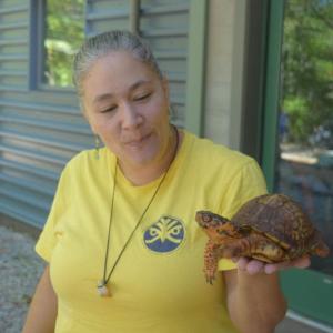 Amanda Nowicka shows off a local turtle. 