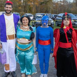 Steve, Melissa, Madison and Viridian dress as characters from Aladdin. f