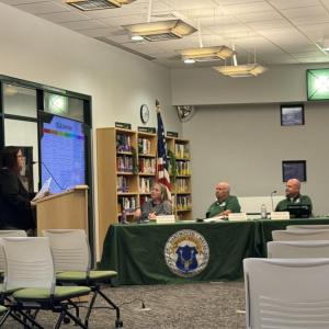 Catie Paveo explains the CKLA program to the committee. Photo by Kat Sheridan