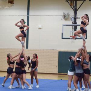 Taylor Beauparland and Cecelia Trahan pose in a stunt. Photos by Kat Sheridan