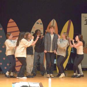 The sardines crowd around Squidward, played by Bryce Clancy. Photos by Kat Sheridan 