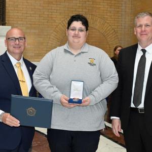 Alyssa Perley with her Employee of the Year award. Source: Bristol County Sheriff's Department