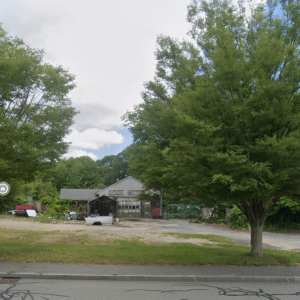 The three-component project would be located at 411 Faunce Corner Road where Rose Motors used to be. Source: Google Maps