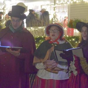 The Victorian Carolers serenade the crowd with Christmas favorites. 