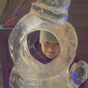 Liam Miller, 7, poses in the ice sculpture.