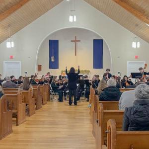 The Dartmouth High School Chamber Orchestra performs.