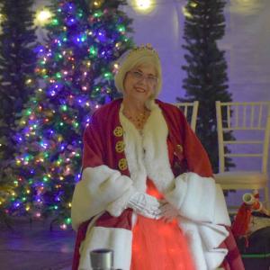 Mrs. Claus shows off her light-up skirt.