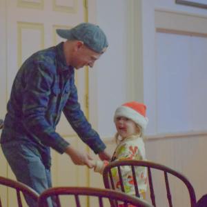 Isaiah Manely dances with his daughter Amelia.