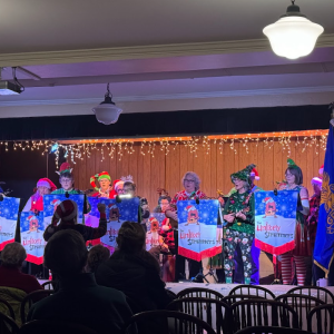 The Unlikely Strummers perform. 