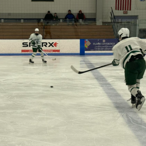 Lucas DeSousa passes the puck.