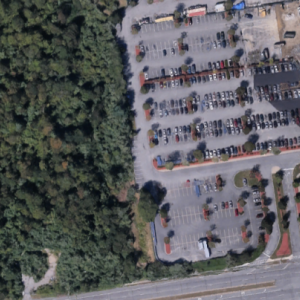 A sky view of the land between the Dartmouth Collision Center (left) and the Walmart (right). Source: Google Earth