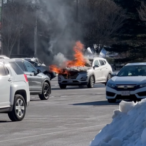 The car on fire. Source: Jaime Lyn Carvalho