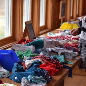 Some of the children's clothes up for grabs at the free market.