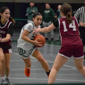 Samantha Murphy blocks Annaleyah Algarin. Photos by Kat Sheridan