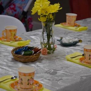 The table set up for high tea.