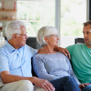 Parents talking to their son. 