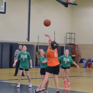 Evelyn Vasconcellos shoots the ball. 