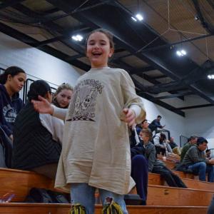 Leah Baptista shows off the shirt she caught.