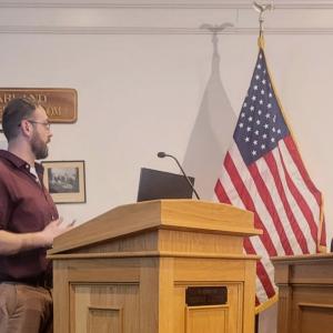 Principal Engineer Damien Dmitruk speaks at a Zoning Board of Appeals meeting on Monday, March 16.