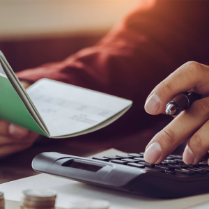 Picture of person doing a budget. 