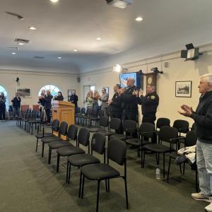 The crowd gave him a standing ovation. 