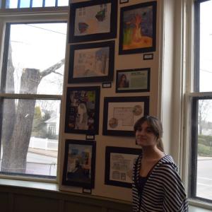 Casey Lima with her art.