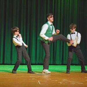 Peter Quinn has some backup during his dance.