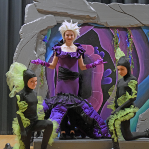 Ursula (Lauren Rose-Wells) with her eels Flotsam and Jetsam (Gracie Rezendes and Isabella Silva)