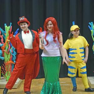 Sebastian (Nicolas Faria,) Ariel (Layla Ruiz,) and Flounder (Julia Thomas.)
