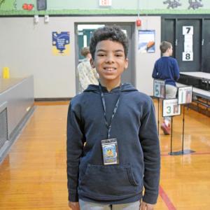 Jayden, one of the designers who won.