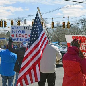 Messages of love and American pride could be seen at the protest.