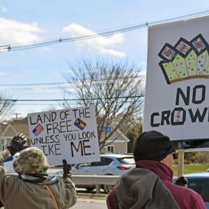 One sign questioned how free this country is.