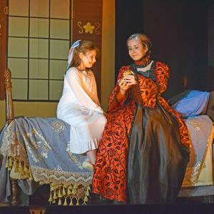 A young Anastasia talks with her grandmother (Chloe Costa.)