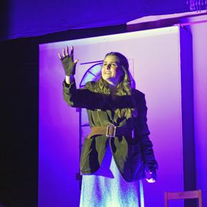 Anya (Emerson Palumbo) sings about the music box. 