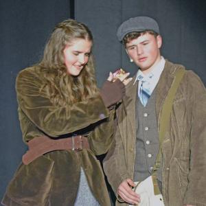 Anya (Emerson Palumbo) and Dimirtry (Jack Nylin) look at a music box. 