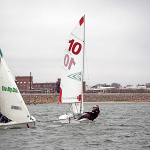 Phoebe Murray and Maisy Sperry practice steadying their boat.