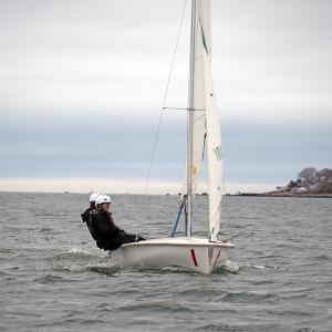 Sam Sperry and Lucas Prout lean to even the boat. 