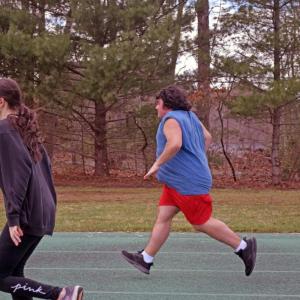 Selena Pacheco and Joe Adao finish their run. 