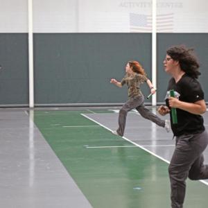 Alexis Benjamin races Nathalia Hanley with Etta Hall in the background