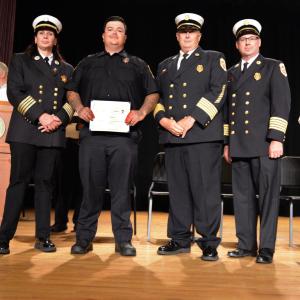Deputy State Fire Marshal Maribel Fournier,  Firefighter Jacob Andrade,   Retired Chief Peter Andrade and Chief Timothy Lancaster. Source: Peter Andrade