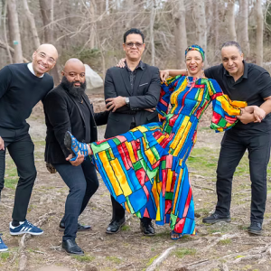 Candida Rose poses with the rest of her band