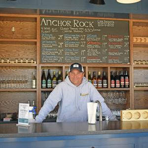 Steve Barwikoski stands at the counter of the tasting room. Photos by Kat Sheridanac