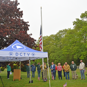 The flag is lowered in memory of the 34 veterans lost from Dartmouth. 